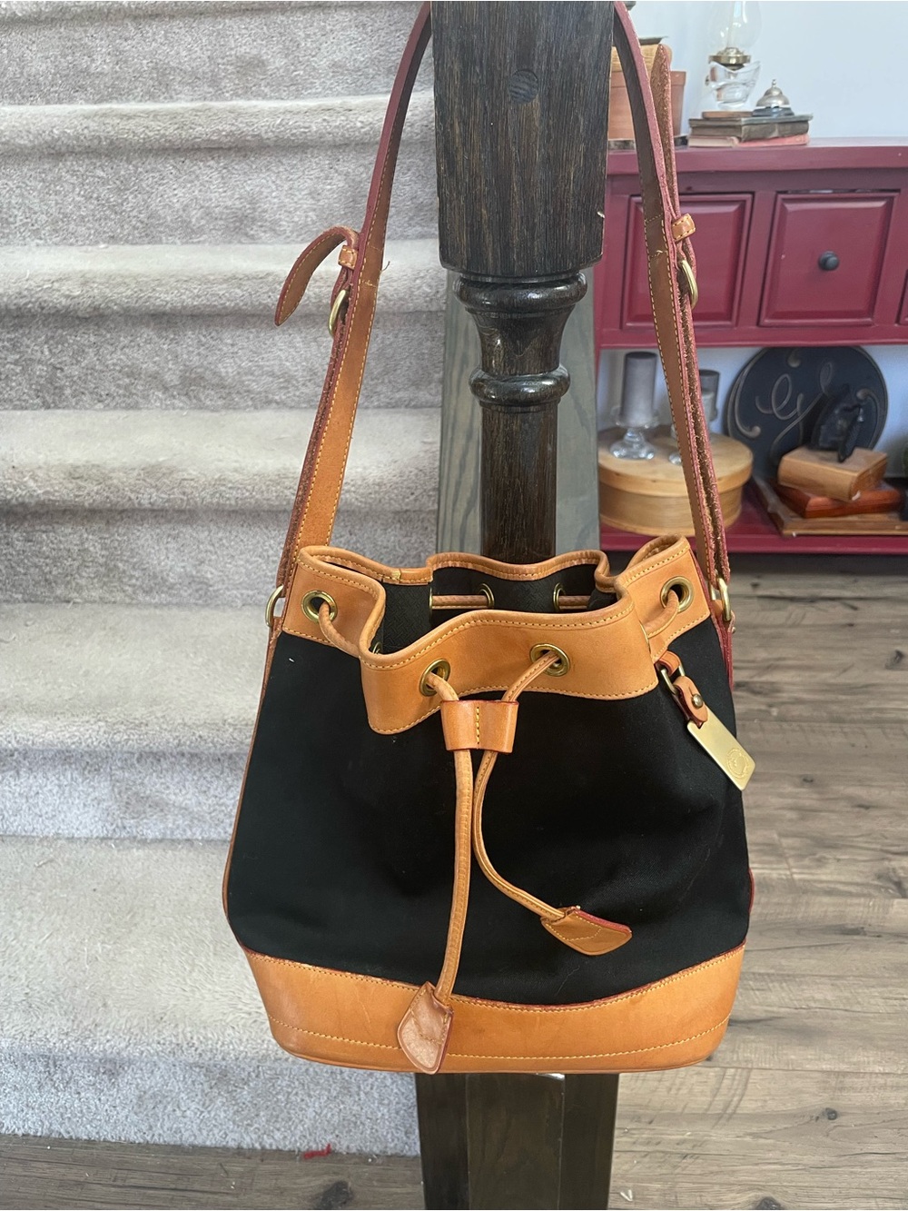 Dooney & Bourke Black Canvas Drawstring Bucket Bag with Tan Leather